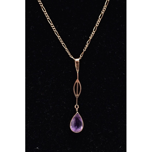 15 - A YELLOW METAL AMETHYST PENDANT NECKLACE, the drop pendant set with a pear cut amethyst within a col... 