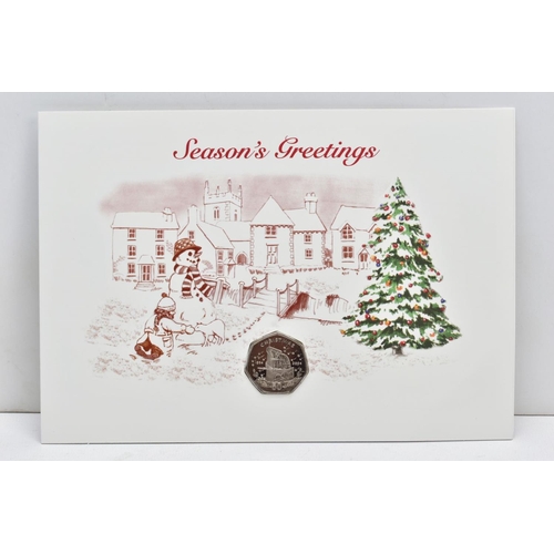 151 - A GROUP OF ISLE OF MAN CHRISTMAS FIFTY PENCE COINS, all diamond finished on greeting cards with C.O.... 