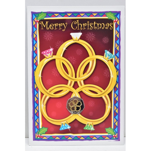 152 - A COLOURED ISLE OF MAN CHRISTMAS FIFTY PENCE Pobjoy diamond finish on card, a few coins have been ta... 