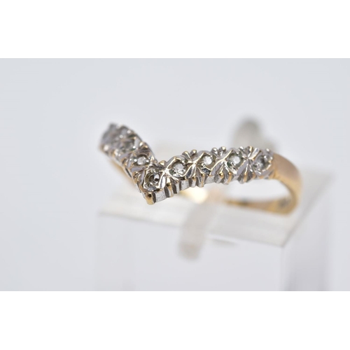 16 - A 9CT GOLD DIAMOND WISHBONE RING, set with a row of single cut diamonds, to a plain polished band, h... 