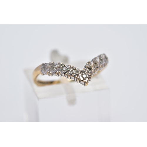 16 - A 9CT GOLD DIAMOND WISHBONE RING, set with a row of single cut diamonds, to a plain polished band, h... 