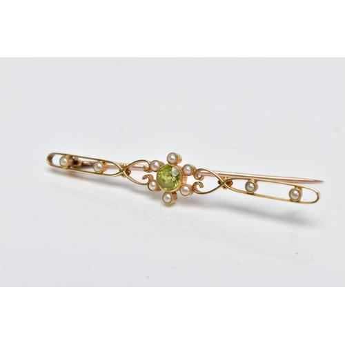 169 - A YELLOW METAL, PERIDOT AND SPLIT PEARL BROOCH, designed with a central circular cut collet set peri... 