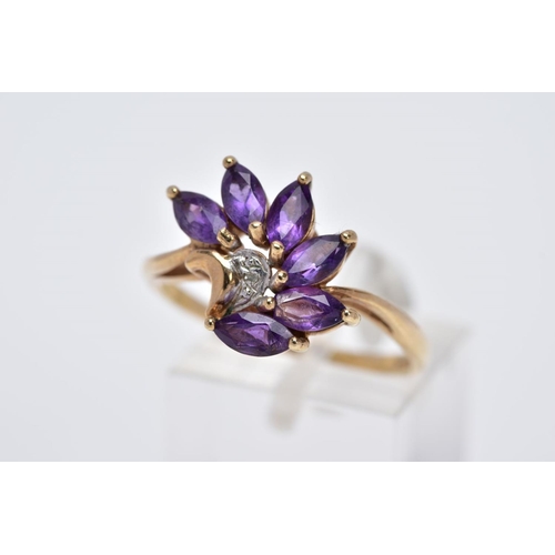 18 - A 9CT GOLD AMETHYST RING, designed as a spray of marquise cut amethyst with a single cut diamond det... 