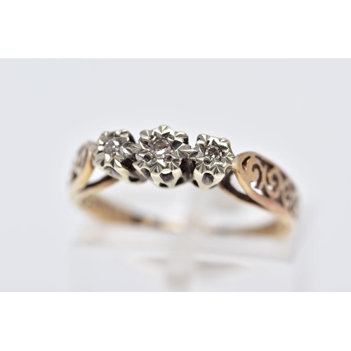 19 - A YELLOW METAL THREE STONE DIAMOND RING, designed with three graduated illusion set single cut diamo... 