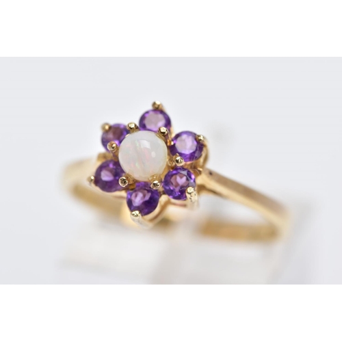 20 - A 9CT GOLD OPAL AND AMETHYST CLUSTER RING, designed with a central opal cabochon (one claw has moved... 