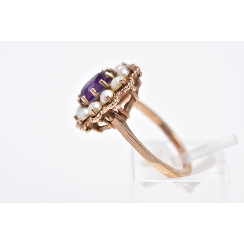 21 - A 9CT GOLD AMETHYST AND SPLIT PEARL CLUSTER RING, the raised cluster designed with a central oval cu... 