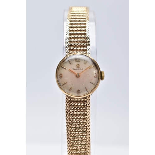 22 - A LADIES MID TO LATE 20TH CENTURY 9CT GOLD OMEGA WRISTWATCH, round silver dial signed 'Omega', Arabi... 