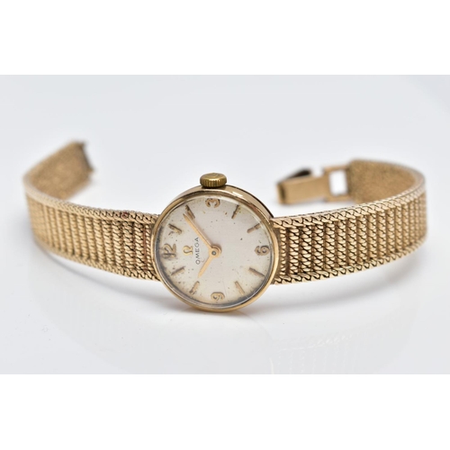 22 - A LADIES MID TO LATE 20TH CENTURY 9CT GOLD OMEGA WRISTWATCH, round silver dial signed 'Omega', Arabi... 