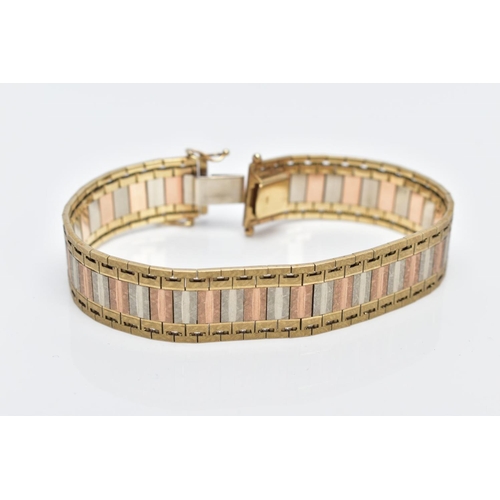 23 - A 9CT TRI-COLOURED GOLD WIDE FLAT LINK BRACELET, designed with textured yellow, rose and white colou... 