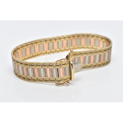 23 - A 9CT TRI-COLOURED GOLD WIDE FLAT LINK BRACELET, designed with textured yellow, rose and white colou... 