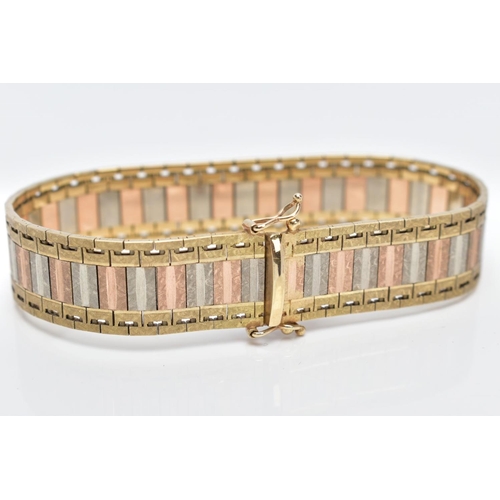 23 - A 9CT TRI-COLOURED GOLD WIDE FLAT LINK BRACELET, designed with textured yellow, rose and white colou... 