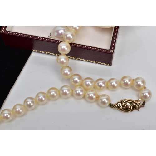 28 - AN AKOYA CULTURED PEAR STRAND NECKLET, fitted with a 9ct gold oval openwork clasp hallmarked 9ct Bir... 