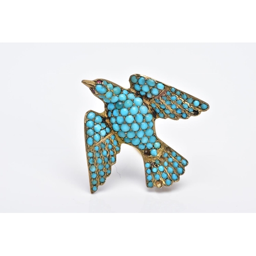 31 - A VICTORIAN SILVER GILT TURQUOISE SET BROOCH, in the form of a bird set with red paste eyes and an e... 