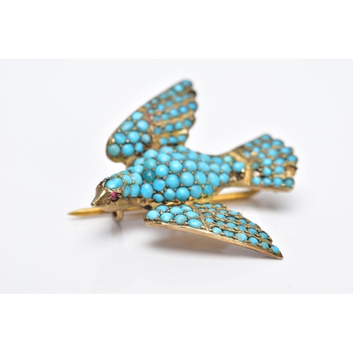 31 - A VICTORIAN SILVER GILT TURQUOISE SET BROOCH, in the form of a bird set with red paste eyes and an e... 