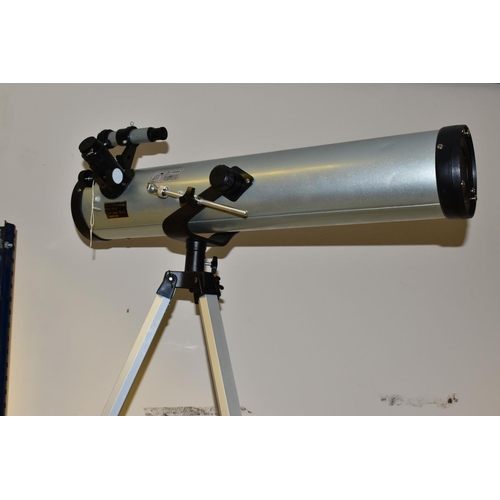 369 - A MODEL 76700 TELESCOPE, diameter 76mm, focal length 700mm, coated lens, mounted on a height adjusta... 