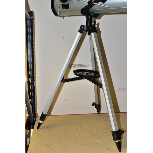 369 - A MODEL 76700 TELESCOPE, diameter 76mm, focal length 700mm, coated lens, mounted on a height adjusta... 