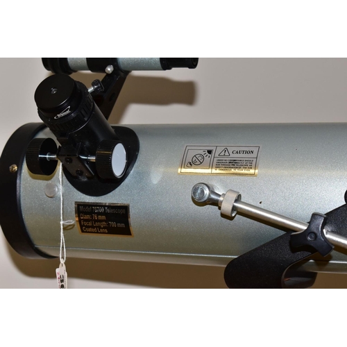 369 - A MODEL 76700 TELESCOPE, diameter 76mm, focal length 700mm, coated lens, mounted on a height adjusta... 