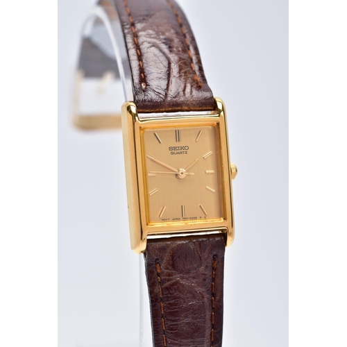 37 - A LADIES GOLD PLATED SEIKO WRISTWATCH, rectangular gold coloured dial signed 'Seiko quartz', baton m... 