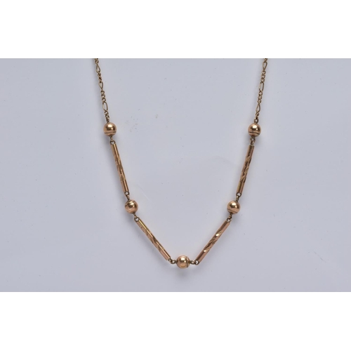 4 - A LATE 20TH CENTURY 9CT GOLD NECKLET, designed with four engraved detailed bars interspaced with bal... 