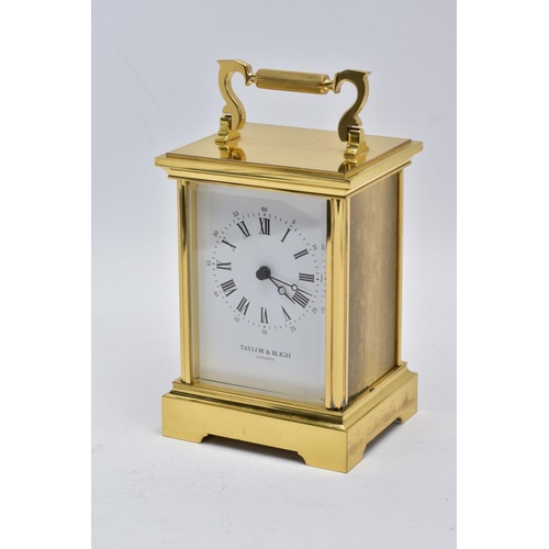 42 - A TAYLOR AND BLIGH CARRIAGE CLOCK, modern battery operated carriage clock with a white dial, signed ... 