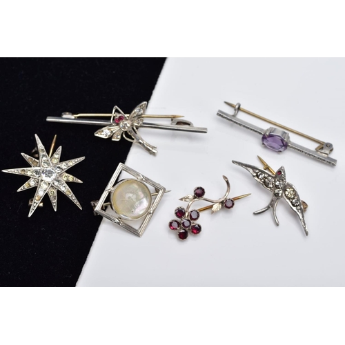 50 - A COLLECTION OF SIX ASSORTED WHITE METAL BROOCHES, to include an early 20th century paste set swallo... 