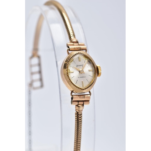 52 - A LADIES 9CT GOLD ACCURIST WRISTWATCH, oval silver dial signed 'Accurist 21 jewels',  baton markers ... 