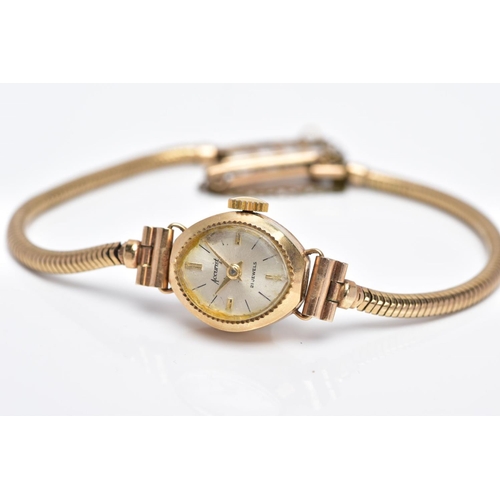 52 - A LADIES 9CT GOLD ACCURIST WRISTWATCH, oval silver dial signed 'Accurist 21 jewels',  baton markers ... 