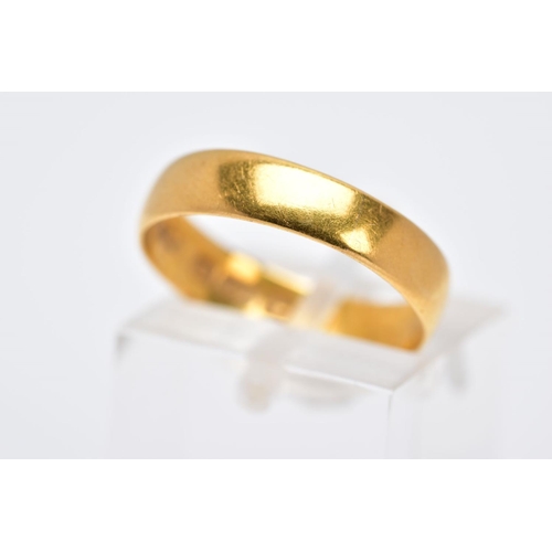 59 - A 22CT GOLD WEDDING BAND, of a plain polished design, approximate width 4.5mm, hallmarked 22ct gold ... 