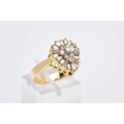 6 - A YELLOW METAL DIAMOND CLUSTER RING, the raised cluster of a pear shape designed with a round brilli... 