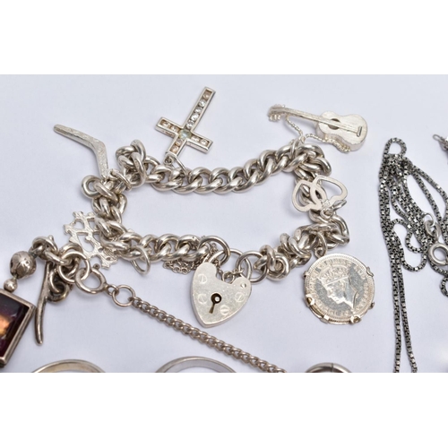 65 - A QUANTITY OF JEWELLERY, to include a silver charm bracelet with each link stamped with a sterling m... 