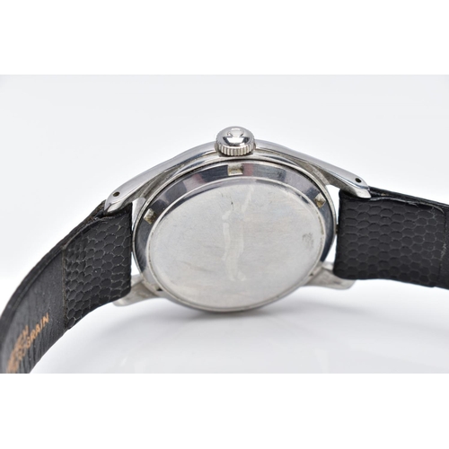 74 - A HAND WOUND OMEGA WRISTWATCH, possibly later cream dial with Arabic numerals, black spade hands wit... 