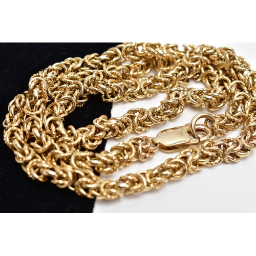 75 - A YELLOW METAL HEAVY CHAIN, byzantine chain designed with plain and textured multi joined circular l... 