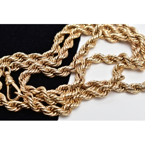 79 - A YELLOW METAL ROPE TWIST CHAIN, fitted with a swivel hook clasp, stamped '9ct', length 680mm, appro... 