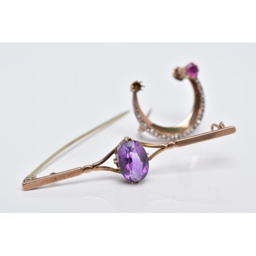 86 - TWO YELLOW METAL BROOCHES, the first bar brooch designed with a claw set oval cut amethyst, bifurcat... 