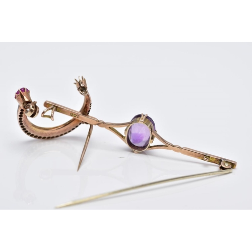 86 - TWO YELLOW METAL BROOCHES, the first bar brooch designed with a claw set oval cut amethyst, bifurcat... 