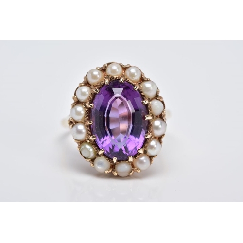 88 - A 9CT GOLD AMETHYST AND PEARL CLUSTER RING, designed with a central oval mix cut amethysts, within a... 