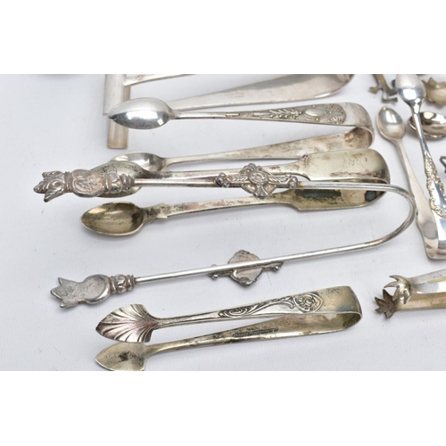 9 - A PAIR OF SILVER SUGAR TONGS AND TWENTY ONE OTHERS, to include a pair of George III bright cut sugar... 