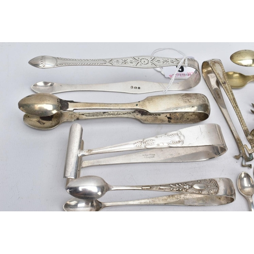 9 - A PAIR OF SILVER SUGAR TONGS AND TWENTY ONE OTHERS, to include a pair of George III bright cut sugar... 