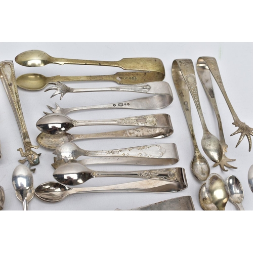 9 - A PAIR OF SILVER SUGAR TONGS AND TWENTY ONE OTHERS, to include a pair of George III bright cut sugar... 