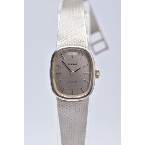 92 - A LADIES 14CT WHITE GOLD TISSOT WRISTWATCH, rounded square silver dial signed 'Tissot Stylist', bato... 