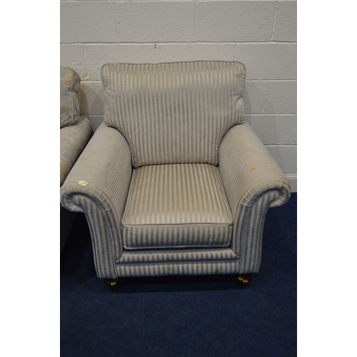 1365 - AN UPHOLSTERED TWO PIECE LOUNGE SUITE, on turned front legs, comprising a gold floral upholstered th... 