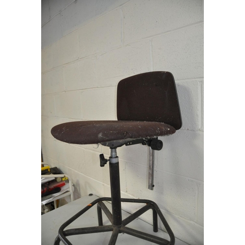 1098 - A VINTAGE DRAUGHTSMANS CHAIR with tubular metal base with foot rest and brown fabric covering and ad... 