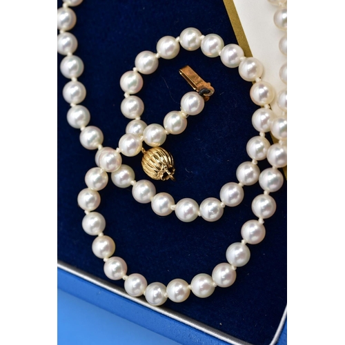 17 - A CULTURED PEARL NECKLACE, individually knotted on a white cord, each pearl approximately 4.6mm, fit... 