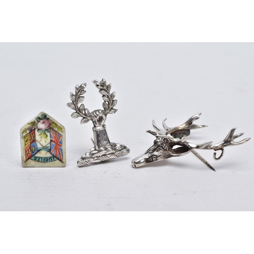 2 - TWO WHITE METAL BROOCHES AND A JUBILEE PLAQUE, the first brooch in the form of a stag head, realisti... 