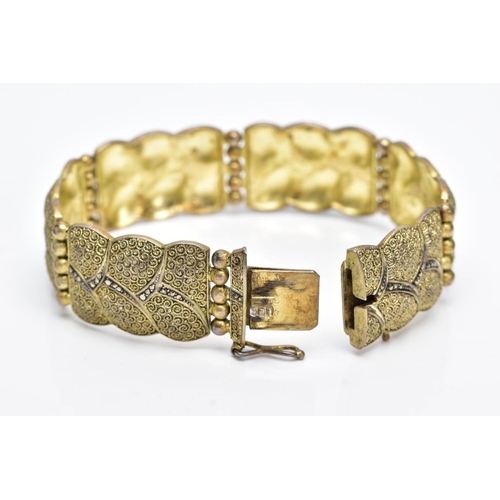 20 - A SILVER GILT MARCASITE WIDE LINK BRACELET, designed with six wavy edge textured links, set with mar... 