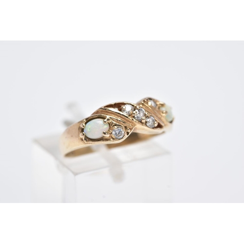 21 - A 9CT GOLD OPAL RING, of a crossover design, set with five circular cut colourless cubic zirconia st... 