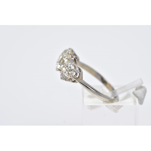 26 - A LATE VICTORIAN TO EARLY TWENTIETH CENTURY THREE STONE DIAMOND RING, centre old cushion diamond est... 