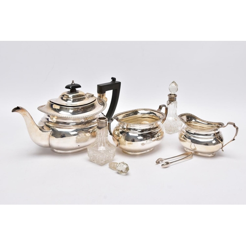 53 - A THREE PIECE SILVER TEA SET AND TWO GLASS VINIAGRETTES, the tea service set comprising a tea pot fi... 