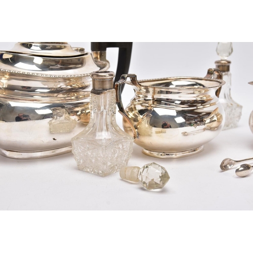 53 - A THREE PIECE SILVER TEA SET AND TWO GLASS VINIAGRETTES, the tea service set comprising a tea pot fi... 