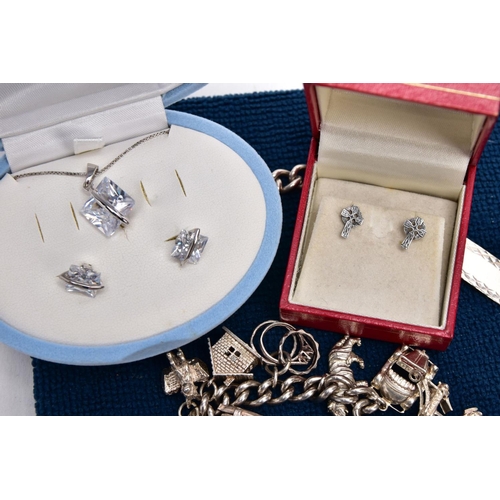 56 - A BOX OF ASSORTED SILVER AND WHITE METAL JEWELLERY, to include a silver charm bracelet suspending fo... 